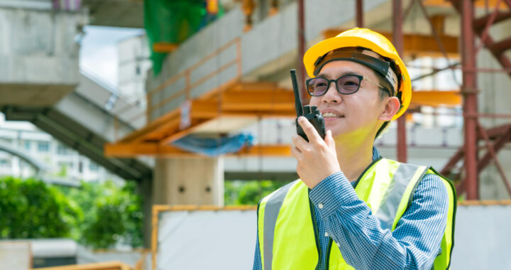 smart-asian-glasses-engineer-use-radio-connection-working-site-construction
