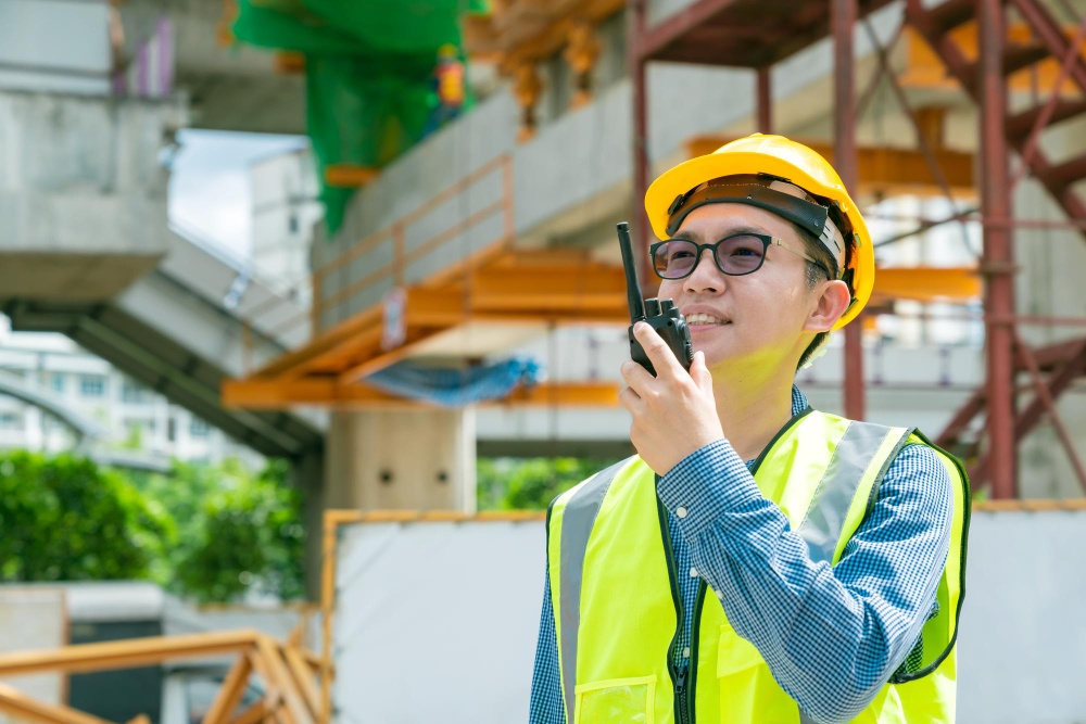smart-asian-glasses-engineer-use-radio-connection-working-site-construction